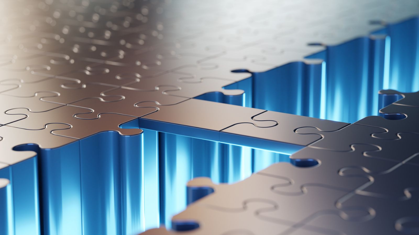 Two interlocking puzzle pieces forming a bridge across an empty blue space, illustrating the connection of disconnected localization processes